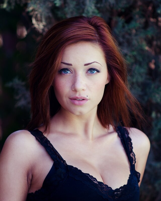 woman with red hair and blue eyes