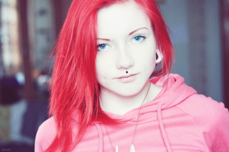 woman with red hair and blue eyes