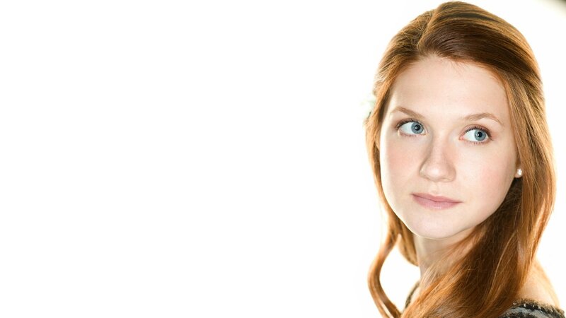 woman with red hair and blue eyes