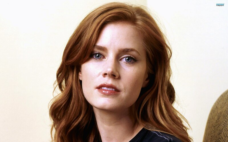 woman with red hair and blue eyes