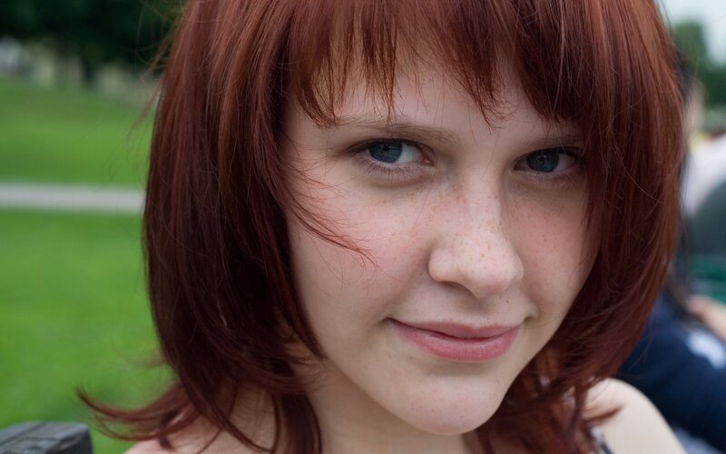 woman with red hair and blue eyes