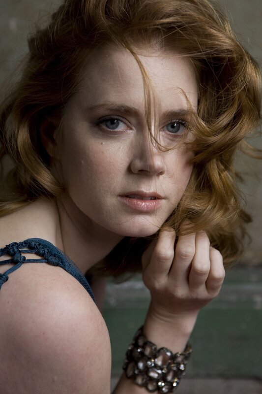woman with red hair and blue eyes