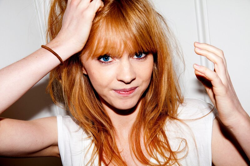 woman with red hair and blue eyes