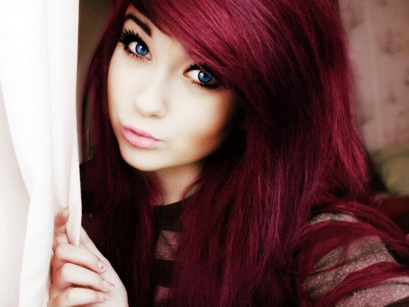 woman with red hair and blue eyes