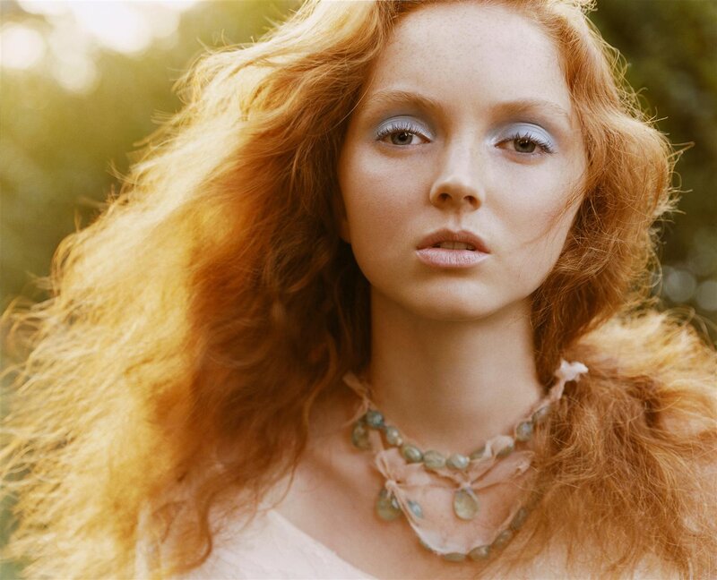 woman with red hair and blue eyes