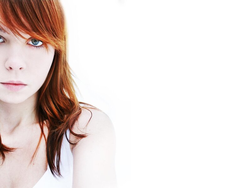 woman with red hair and blue eyes