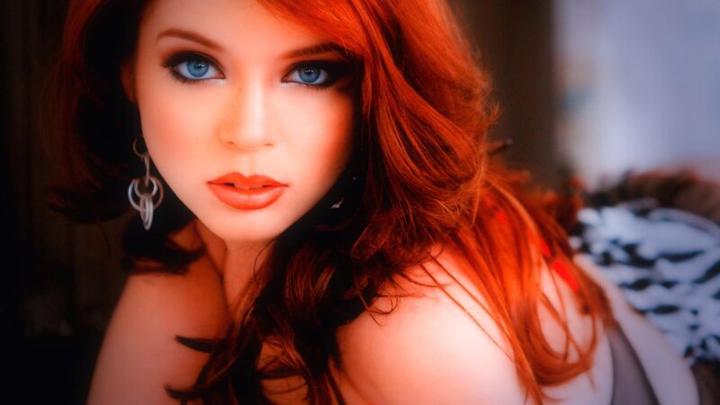 woman with red hair and blue eyes