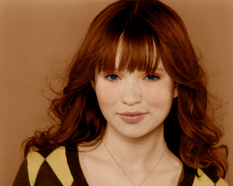 woman with red hair and blue eyes