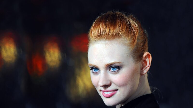 woman with red hair and blue eyes