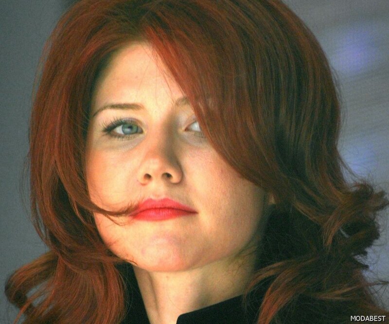 woman with red hair and blue eyes
