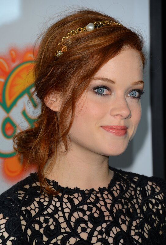 woman with red hair and blue eyes