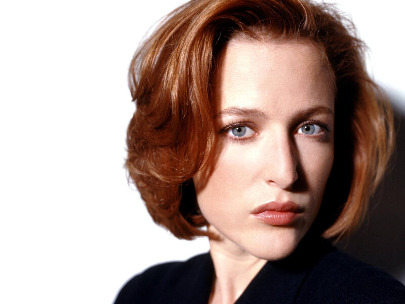 woman with red hair and blue eyes