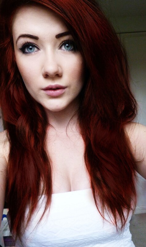 woman with red hair and blue eyes