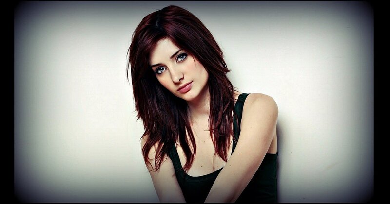 woman with red hair and blue eyes