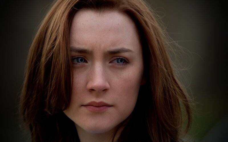 woman with red hair and blue eyes