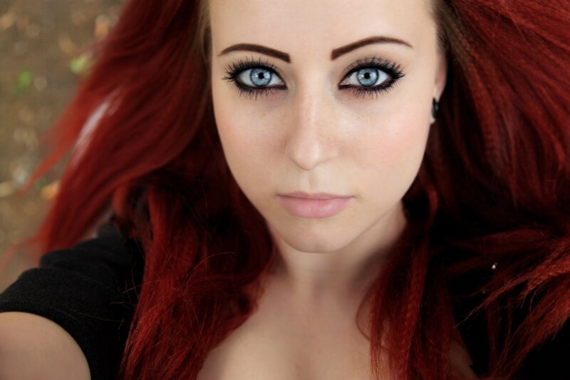 woman with red hair and blue eyes