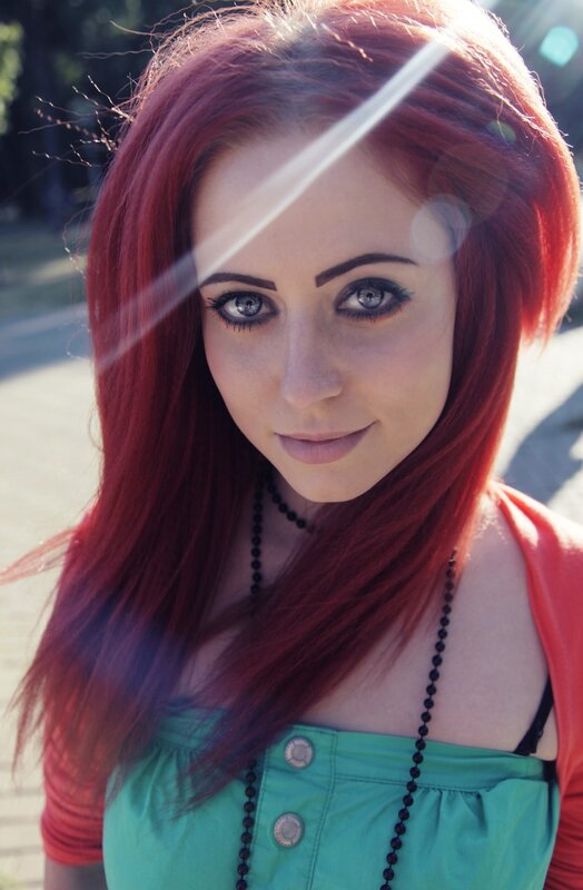 woman with red hair and blue eyes