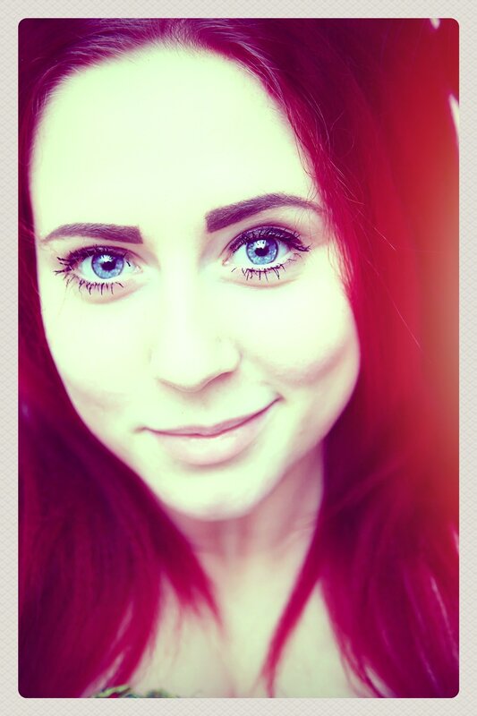 woman with red hair and blue eyes