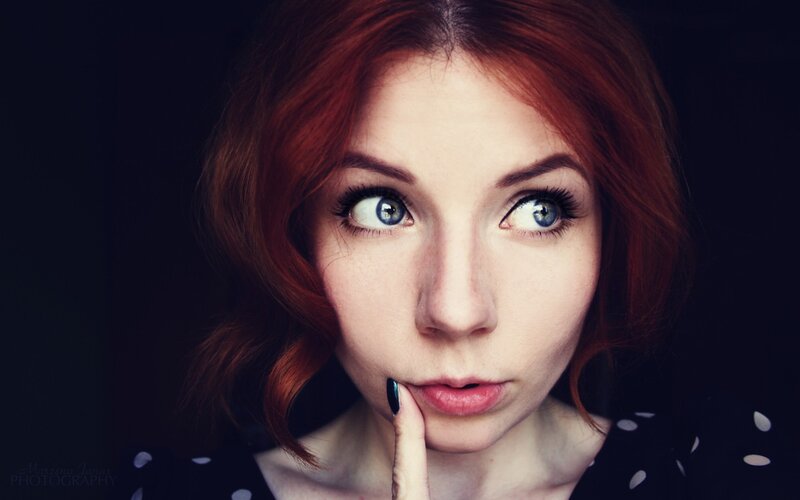 woman with red hair and blue eyes