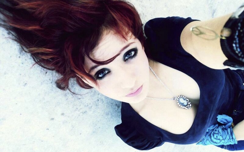 woman with red hair and blue eyes
