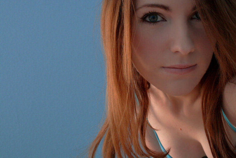 woman with red hair and blue eyes