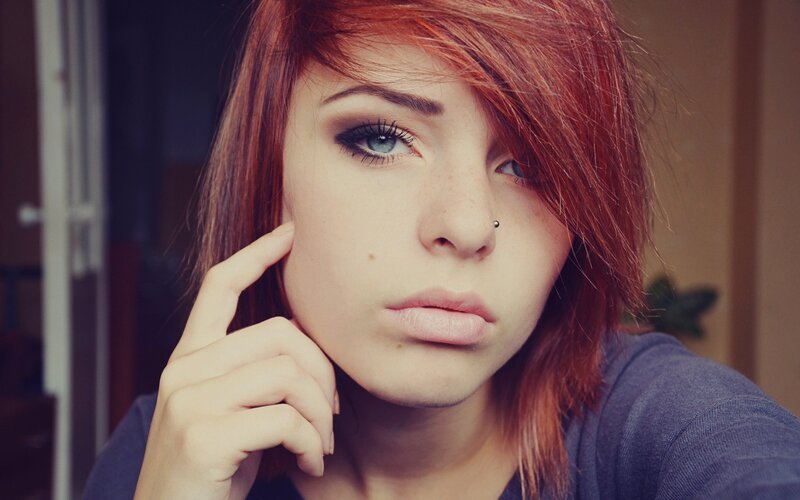 woman with red hair and blue eyes