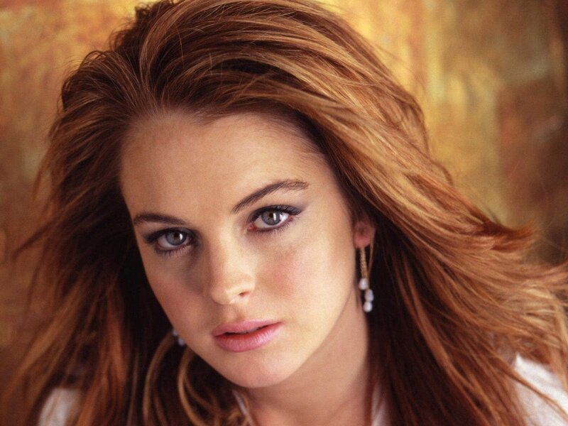 woman with red hair and blue eyes