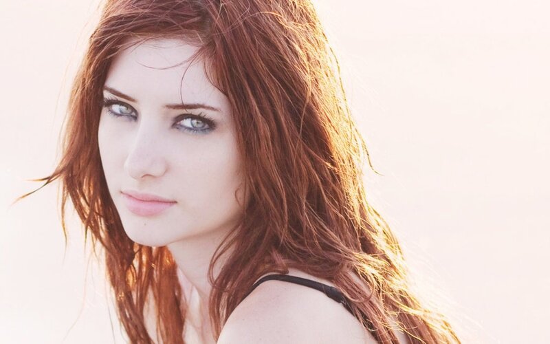 woman with red hair and blue eyes