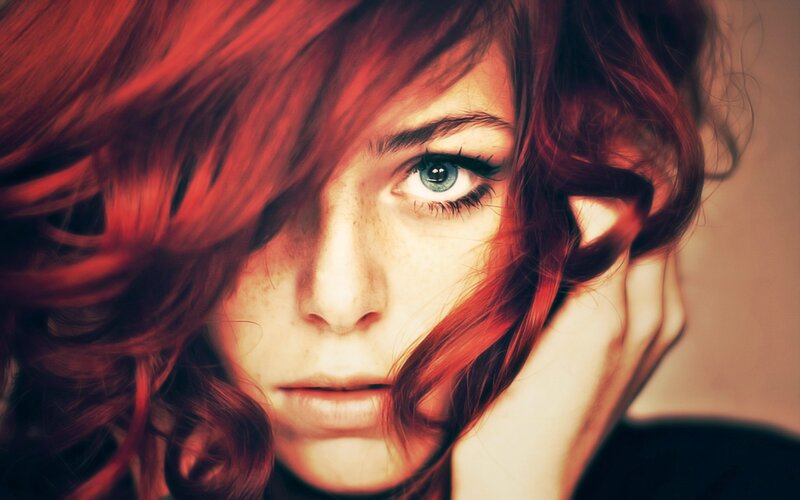woman with red hair and blue eyes