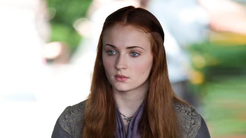 woman with red hair and blue eyes