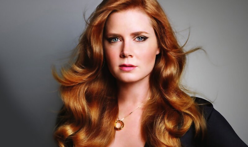 woman with red hair and blue eyes
