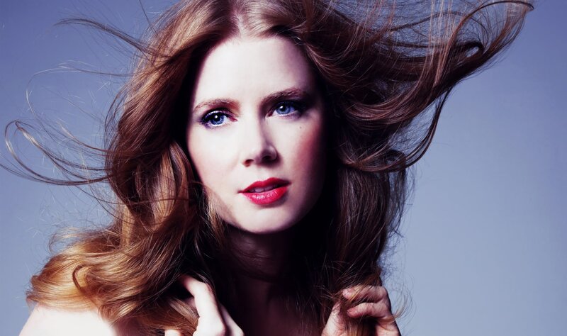 woman with red hair and blue eyes