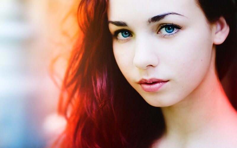 woman with red hair and blue eyes