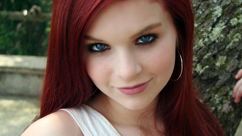 woman with red hair and blue eyes