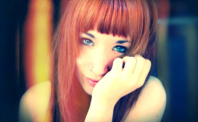woman with red hair and blue eyes