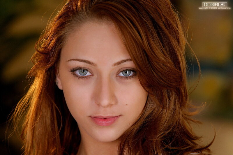 woman with red hair and blue eyes