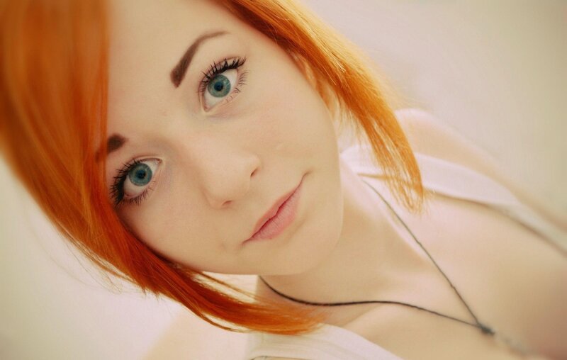 woman with red hair and blue eyes