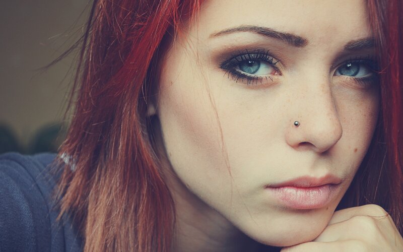 woman with red hair and blue eyes