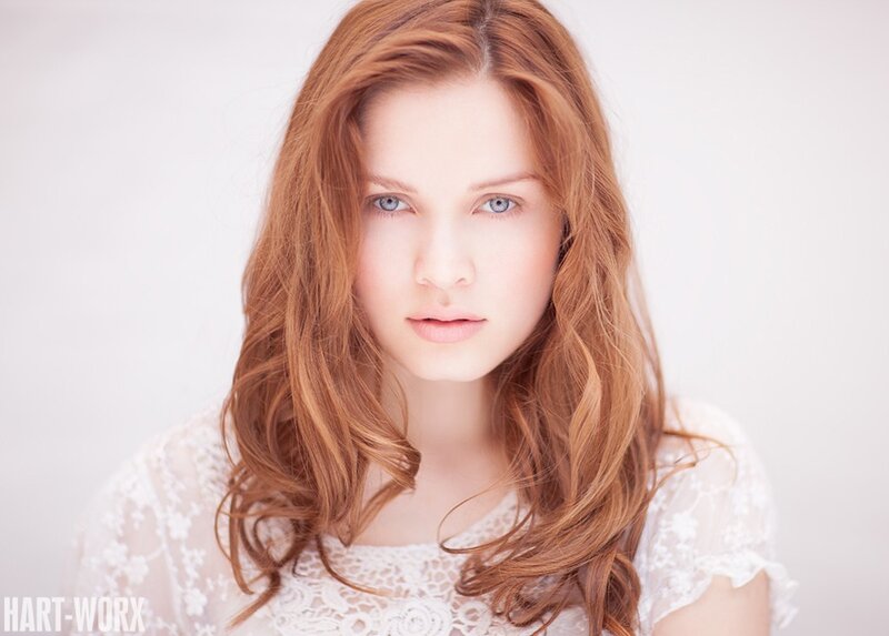woman with red hair and blue eyes