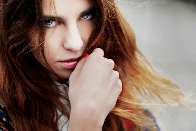 woman with red hair and blue eyes