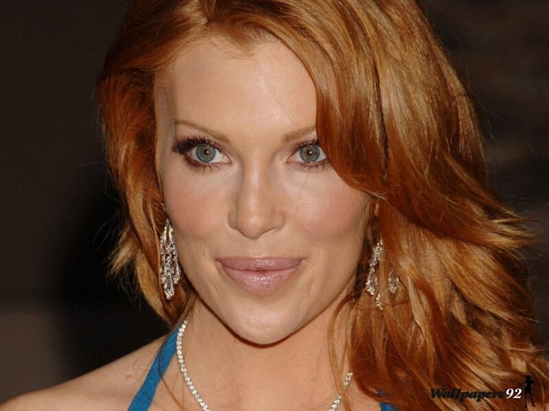 woman with red hair and blue eyes