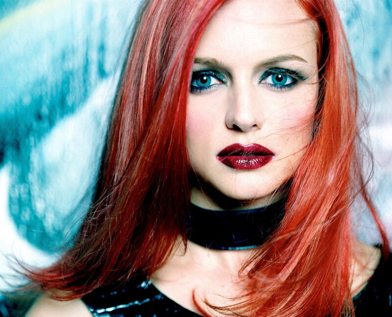 woman with red hair and blue eyes