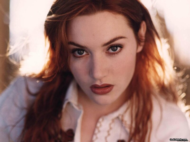 woman with red hair and blue eyes
