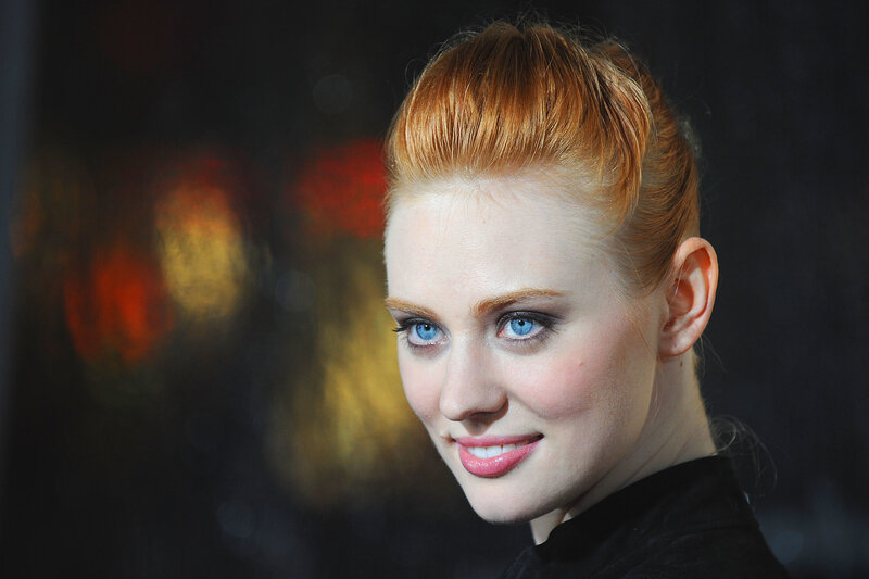 woman with red hair and blue eyes