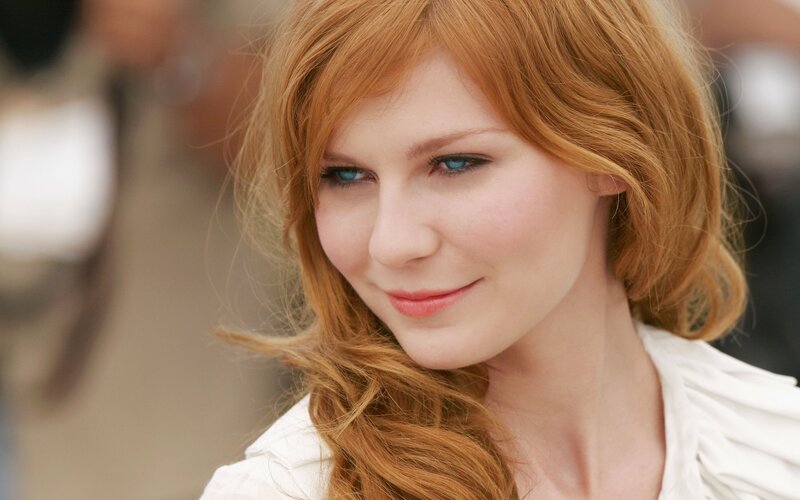 woman with red hair and blue eyes