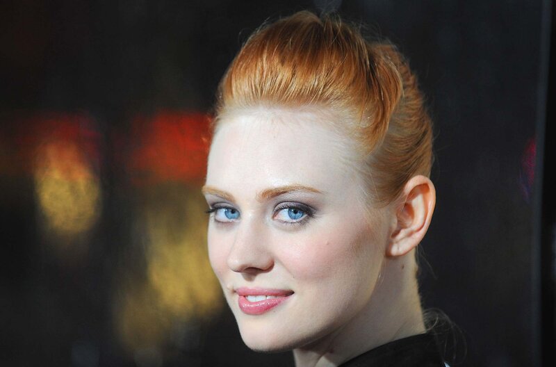 woman with red hair and blue eyes