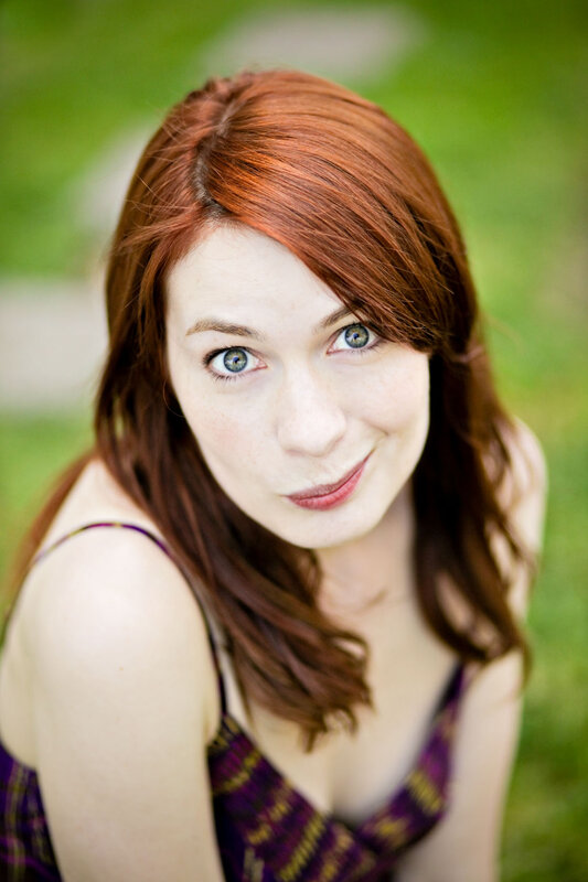 woman with red hair and blue eyes