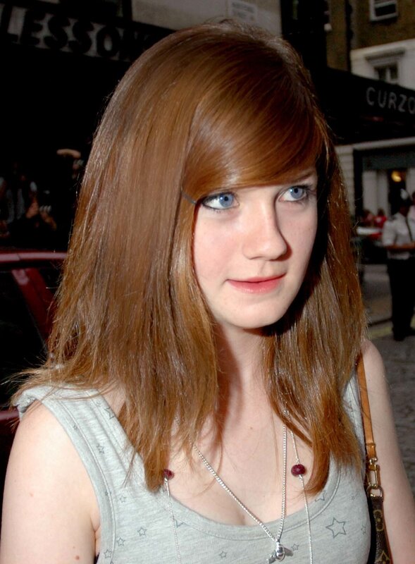 woman with red hair and blue eyes