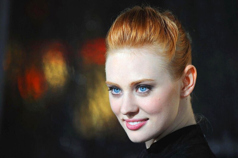 woman with red hair and blue eyes