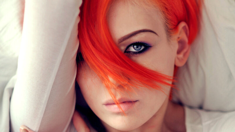 woman with red hair and blue eyes